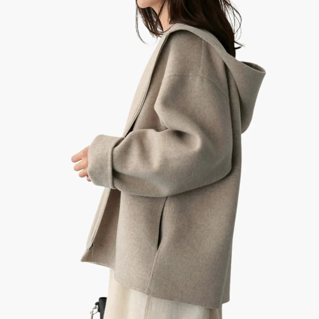 Women's jacket with hood, zipper, and side pockets