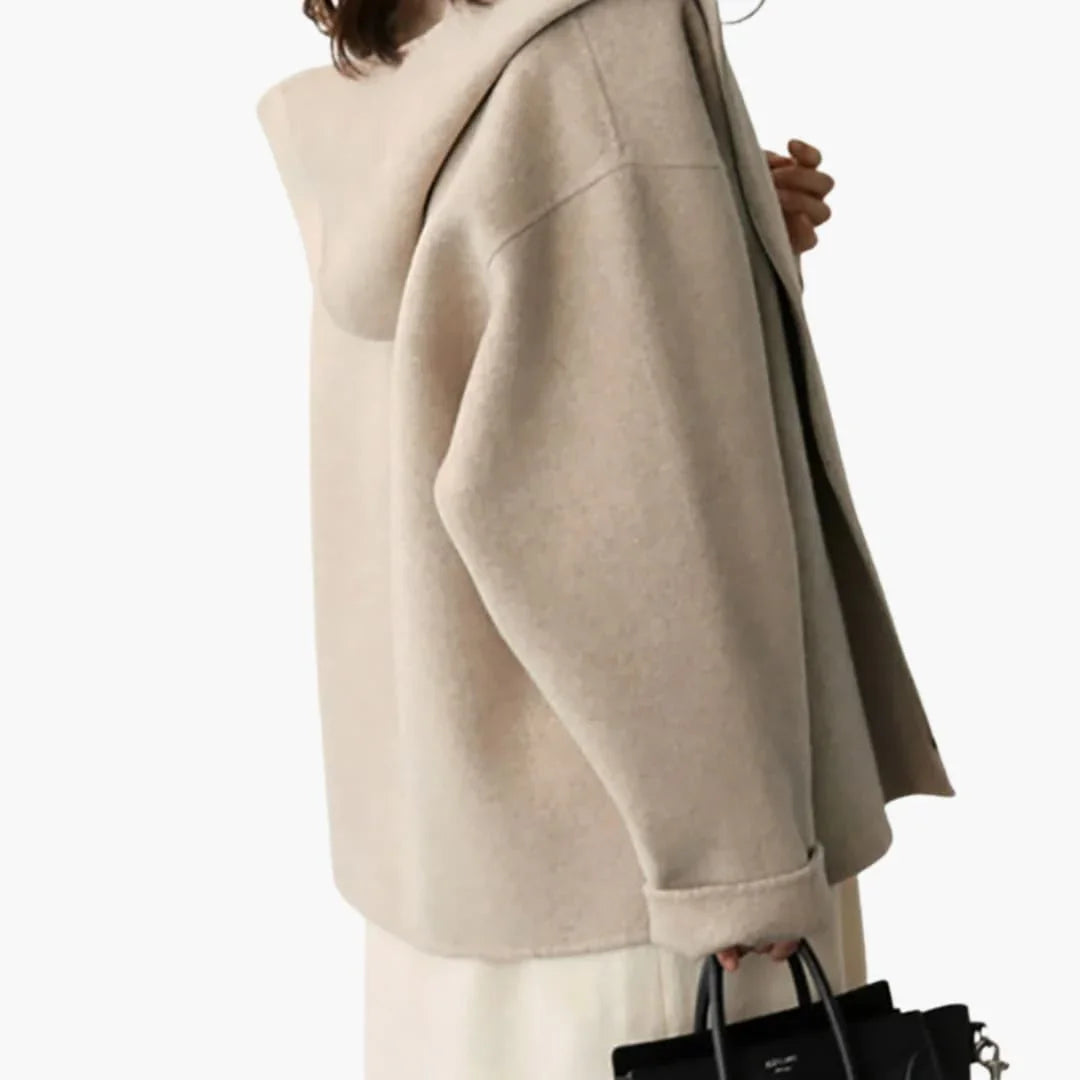 Women's jacket with hood, zipper, and side pockets