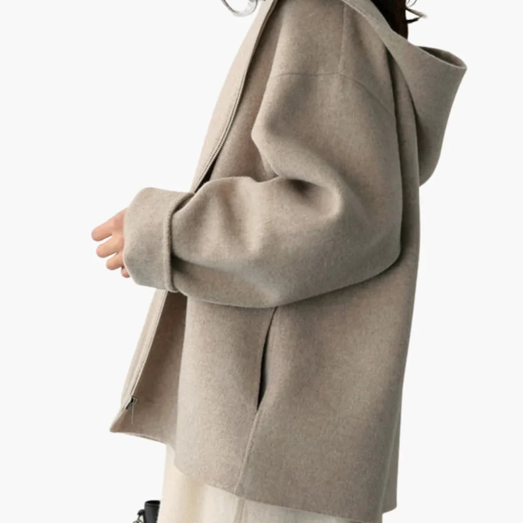 Women's jacket with hood, zipper, and side pockets
