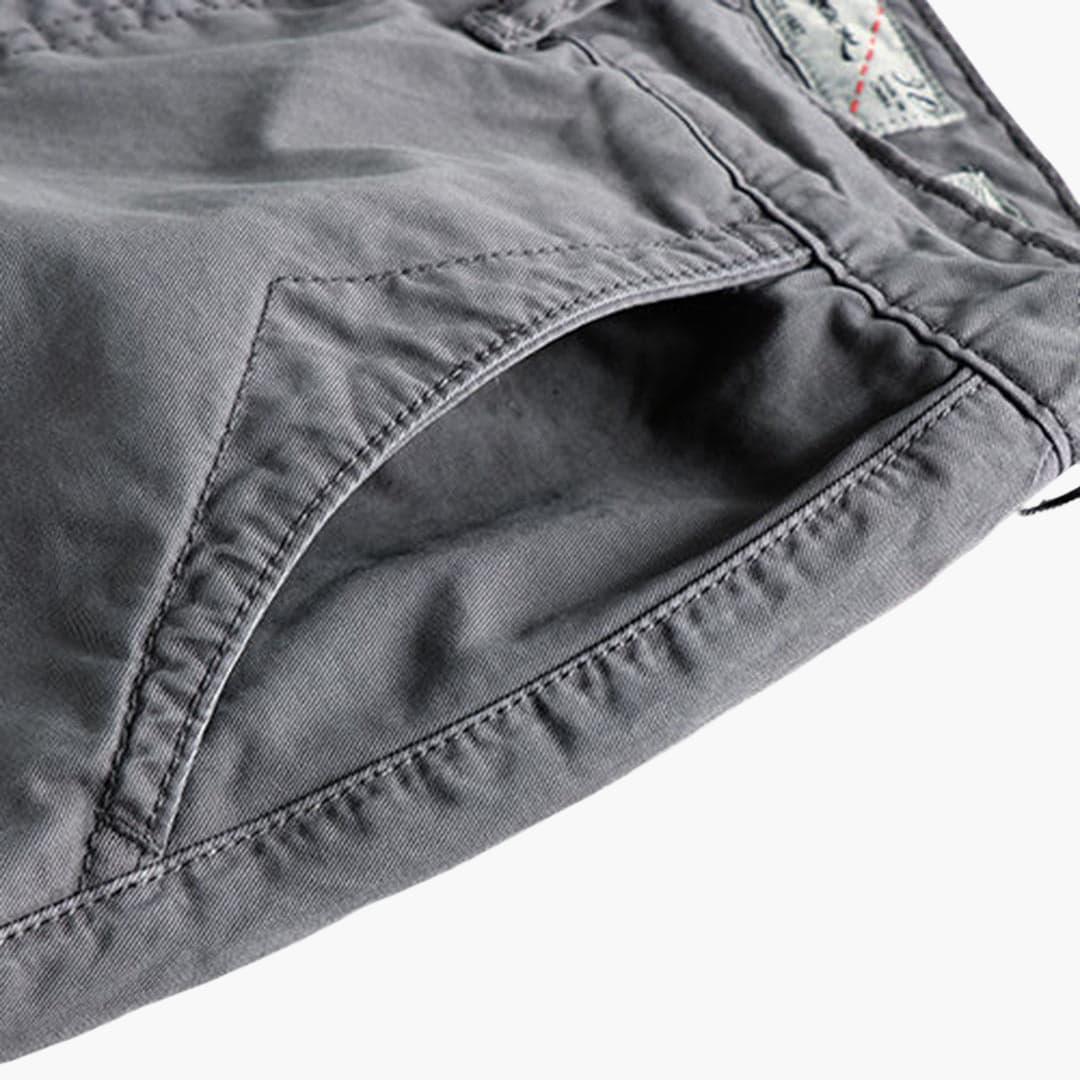 Men's shorts made of lightweight summer fabric with pockets and button closure